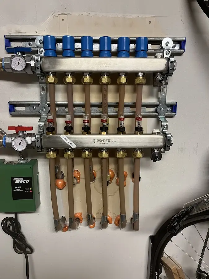 Plumber performing Leak Detection at a residential property in Fort Thomas